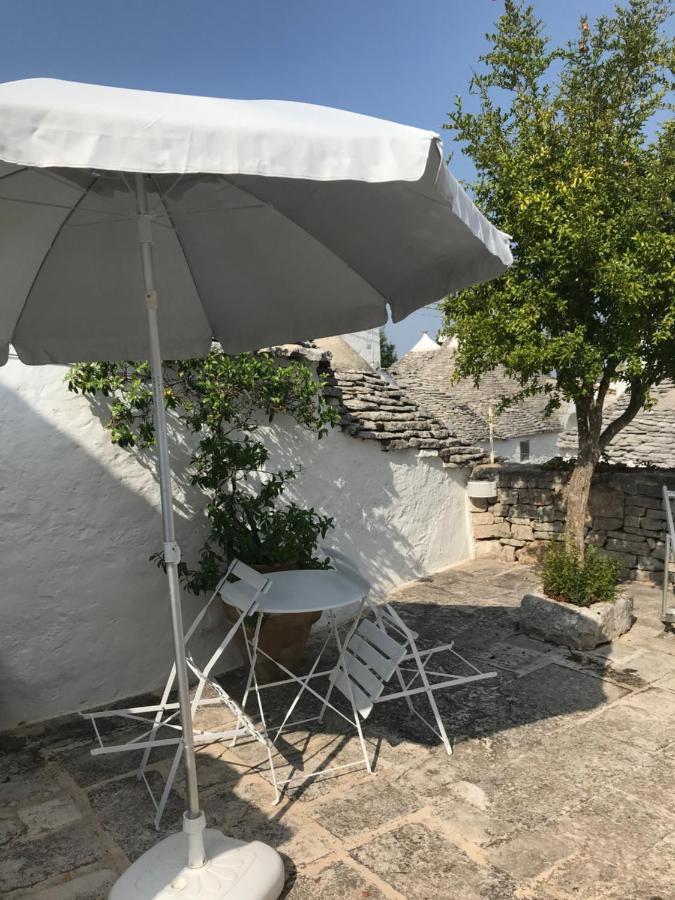 Апартаменты Trulli Aria Di Casa Альберобелло Экстерьер фото